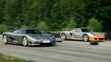 Porsche Carrera GT vs Koenigsegg CCR Evolution x 2 Races to 200 mph / 320 km/h