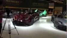 Mansory Ferrari F12 red carbon, Mansory Lamborghini Aventador Roadster and stand overview