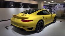 Yellow Porsche 991 Turbo in detail exterior with Porsche Exclusive options